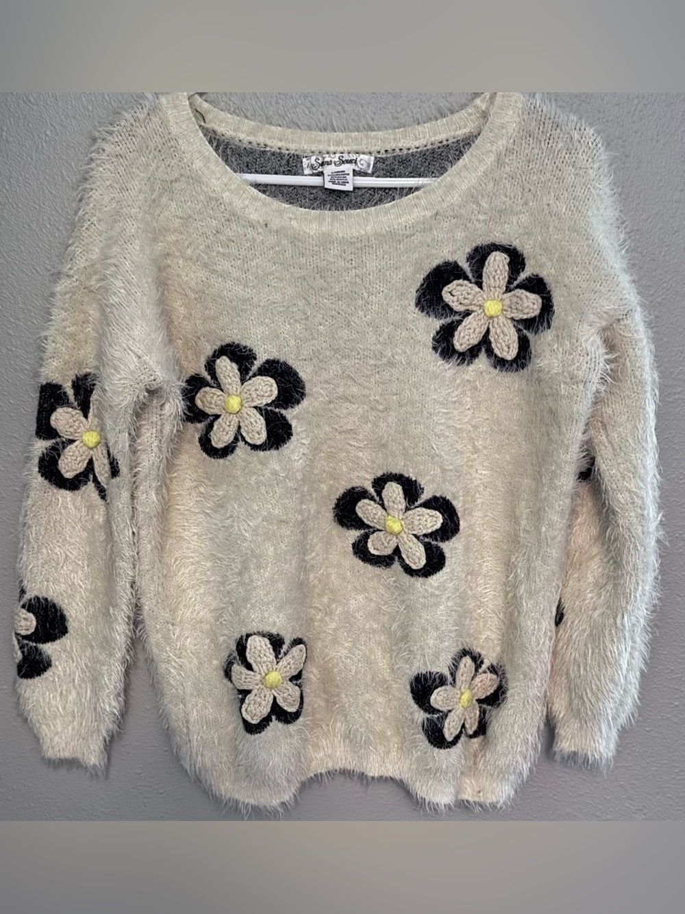 Sans Souci Cream Fuzzy Sweater with Black Daisy Floral Appliqués